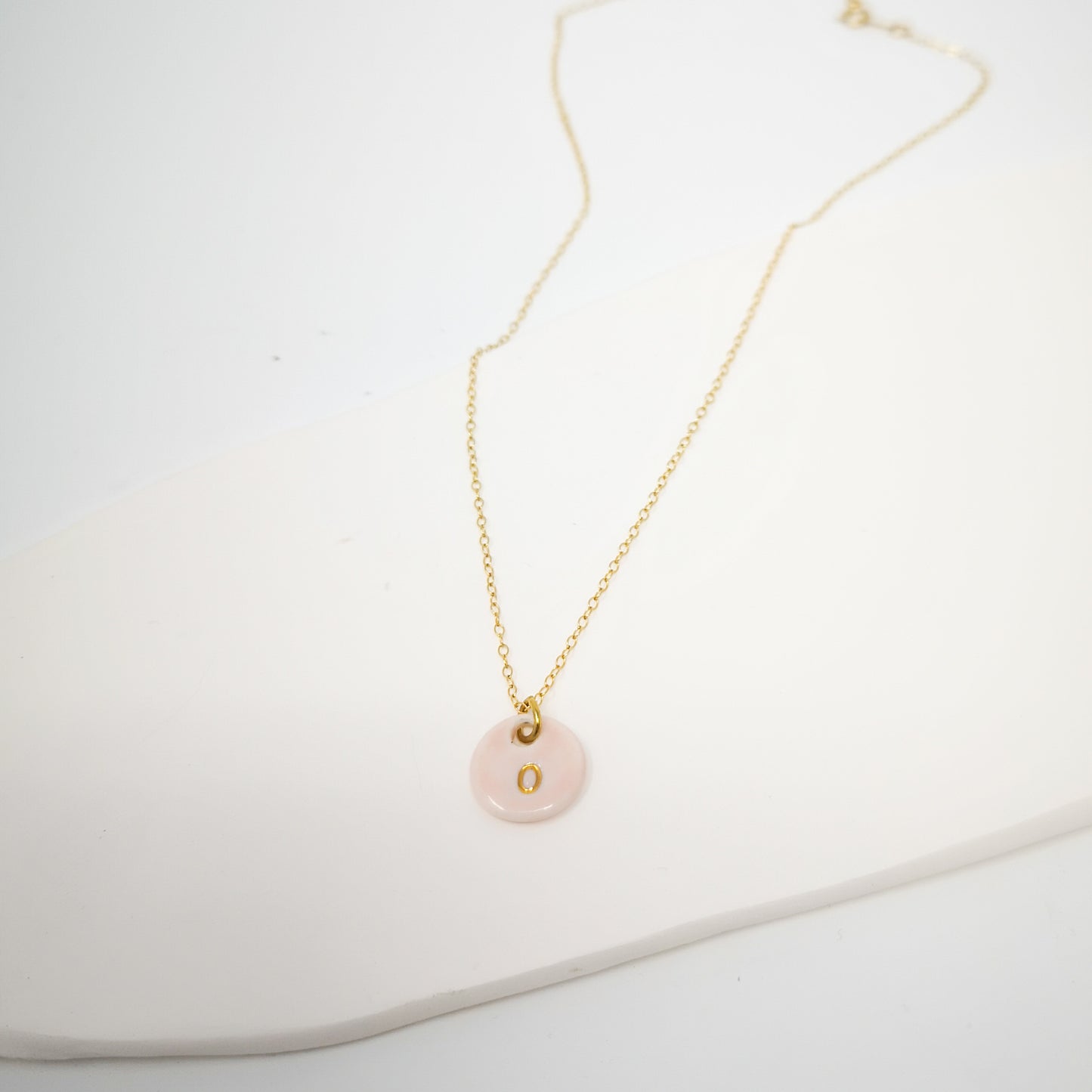 Initial chain pink